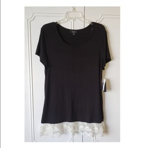 Short sleeved black tunic top with lace at bottom